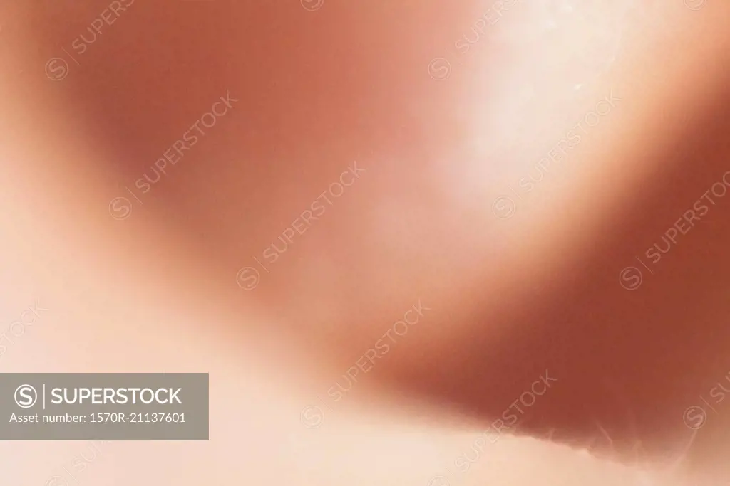 Extreme close-up of woman's ear