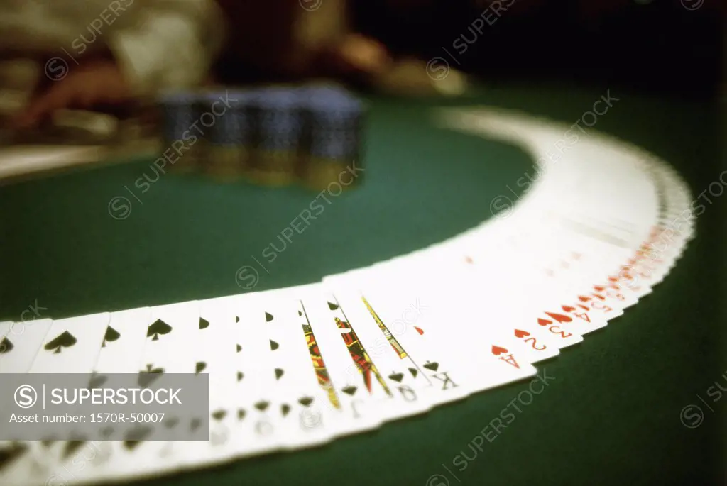 deck of cards on a poker table