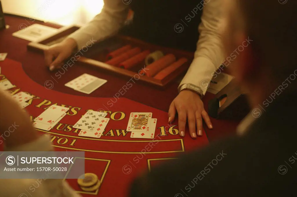 Detail of people playing blackjack