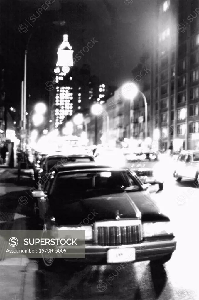 A limousine on a New York city street at night