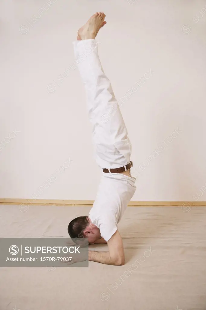 A man in a handstand