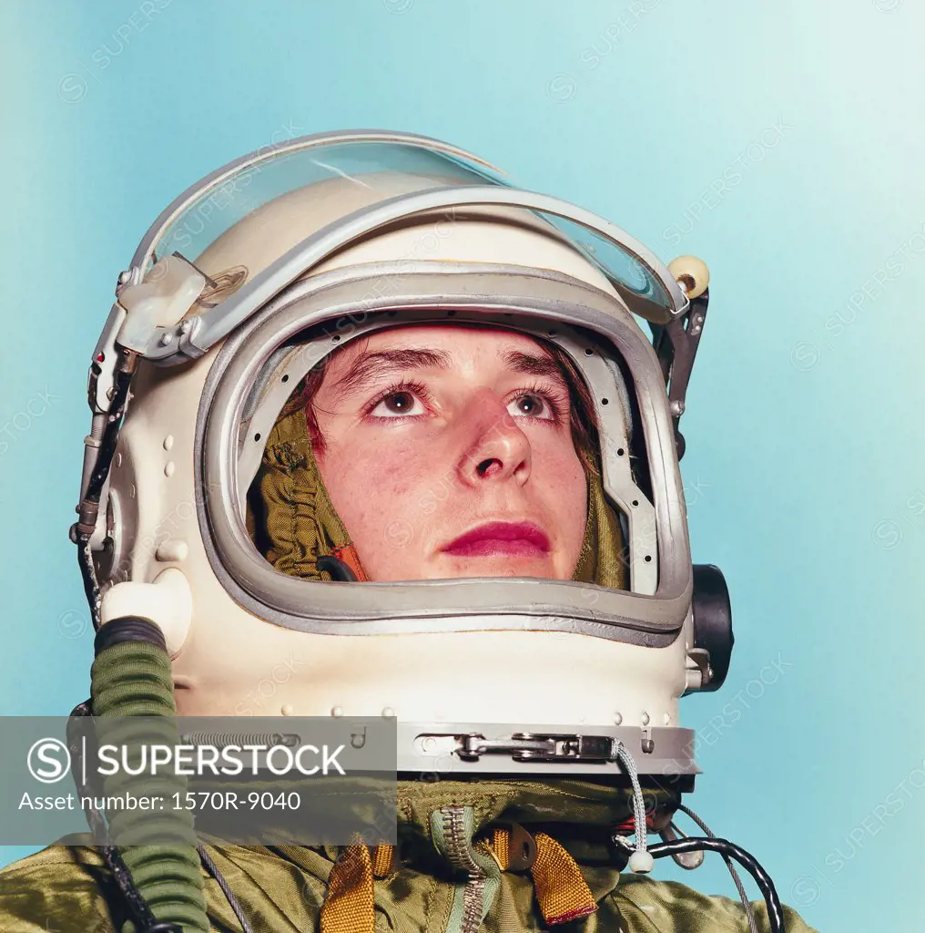 young man posing as an astronaut