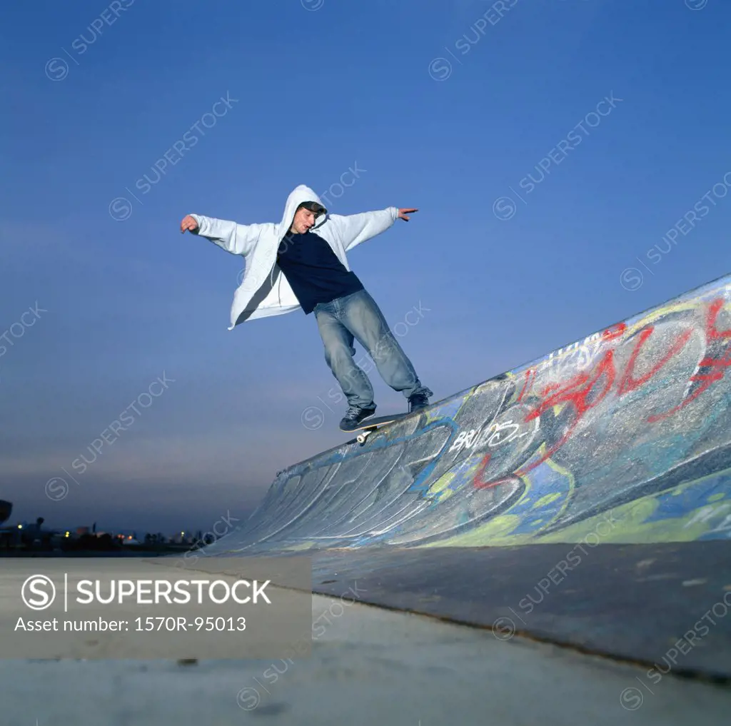 Man balancing on skateboard 