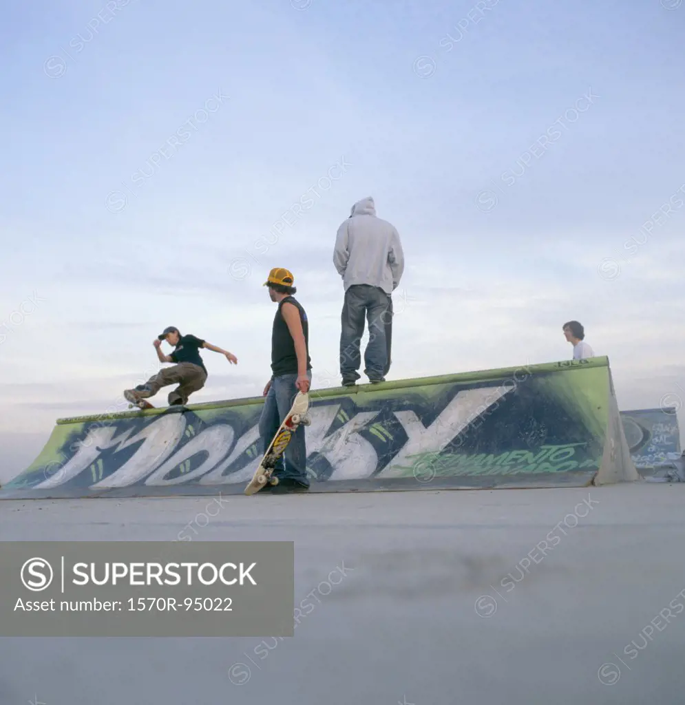 Group of skateboarders near ramp 
