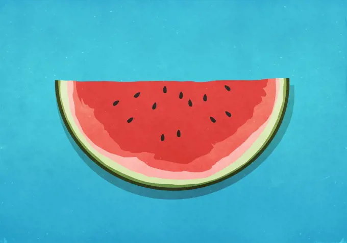 Watermelon slice on blue background