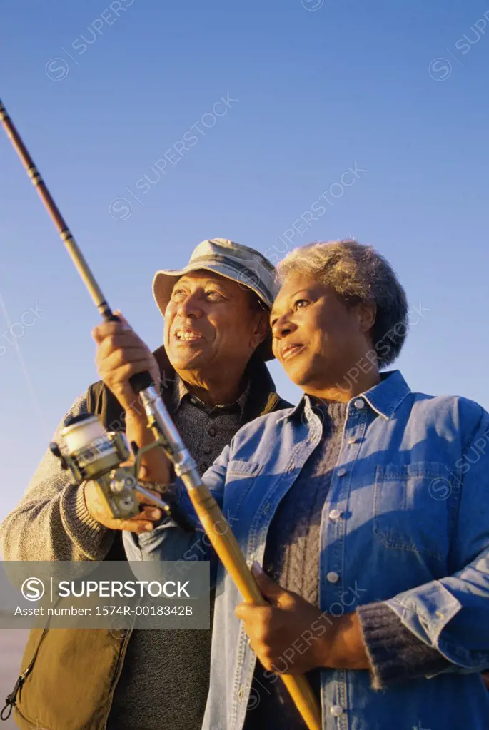 Senior couple fishing together
