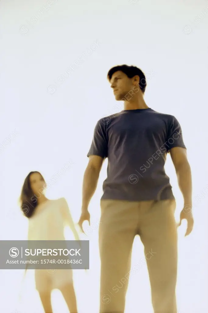 Low angle view of a young couple standing
