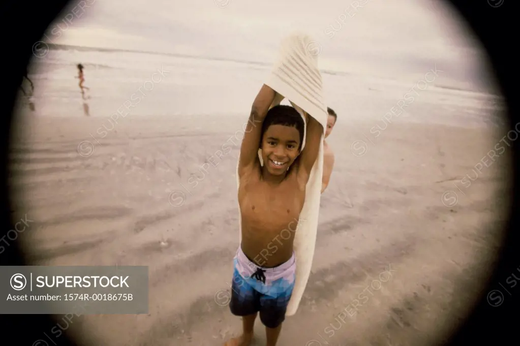 High angle view of a boy at the beach