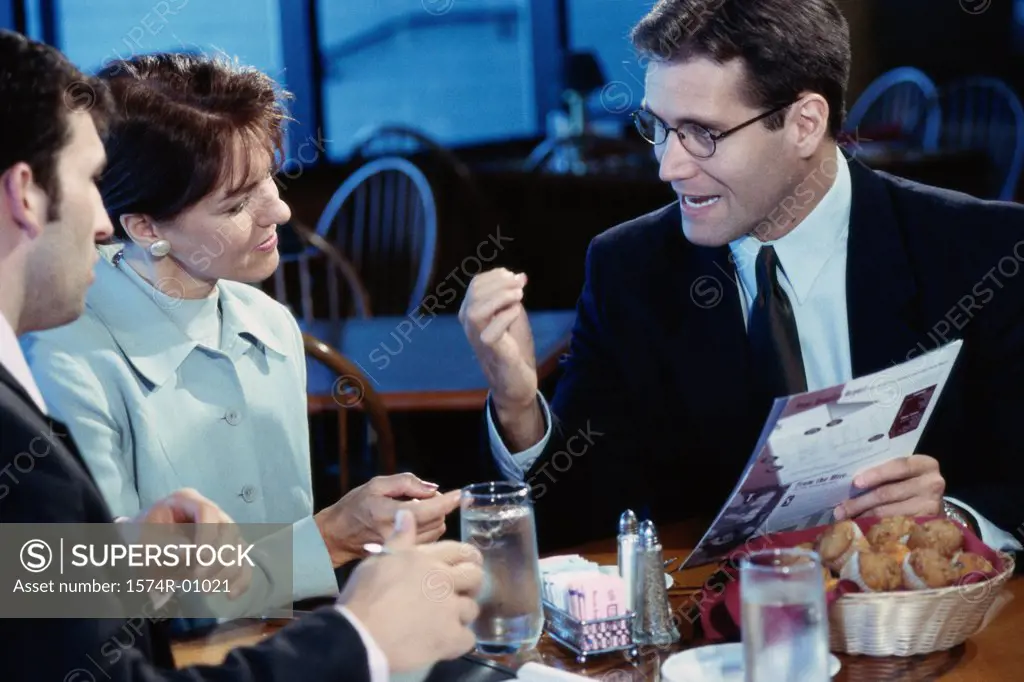 Business executives seated at a restaurant