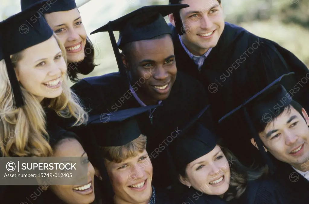 High angle view of a group of young graduates smiling