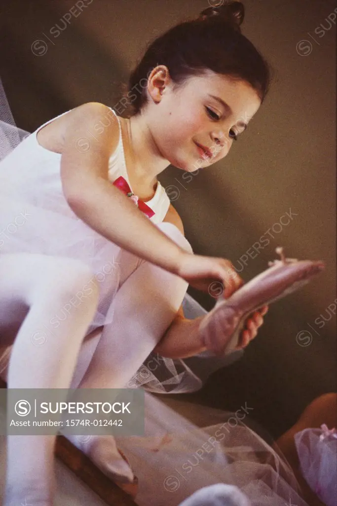 Low angle view of a ballerina wearing ballet slippers