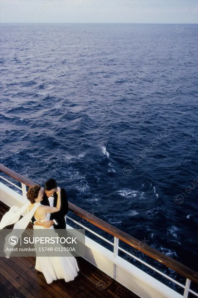 High angle view of a mature couple dancing on the deck of a cruise ship
