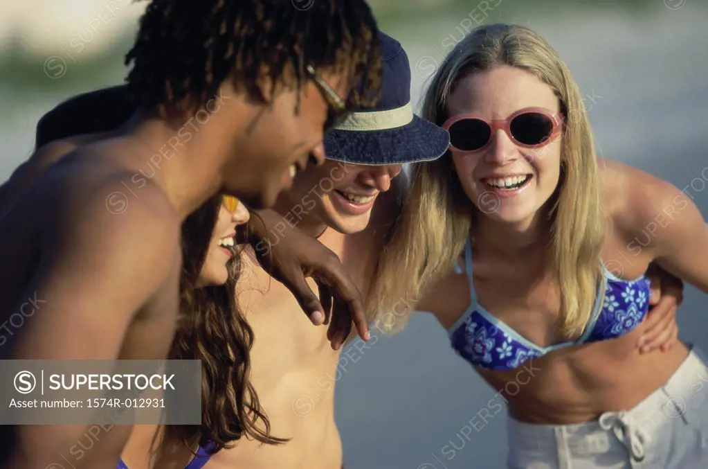 Two teenage couples smiling