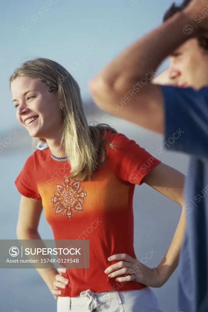 Close-up of a teenage couple on the beach