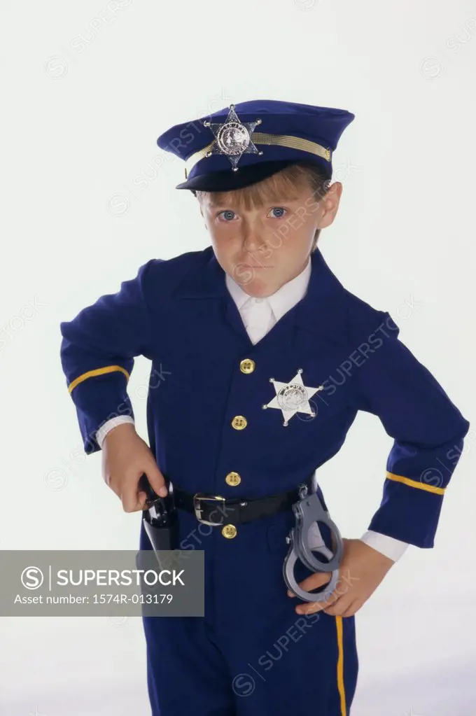 Portrait of a boy dressed as a policeman