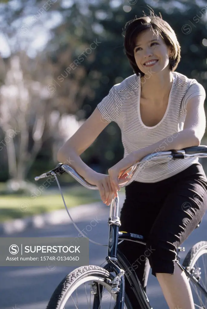 Young woman riding a bicycle