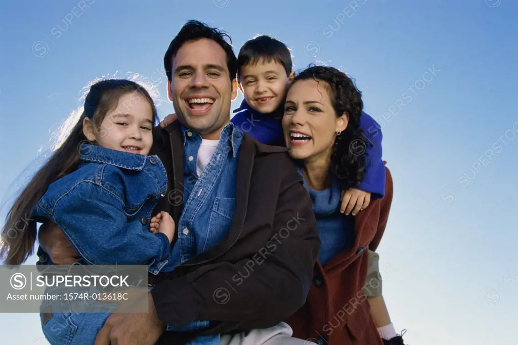 Portrait of parents with their son and daughter