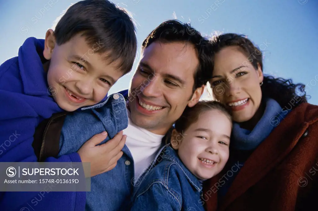 Portrait of parents with their son and daughter