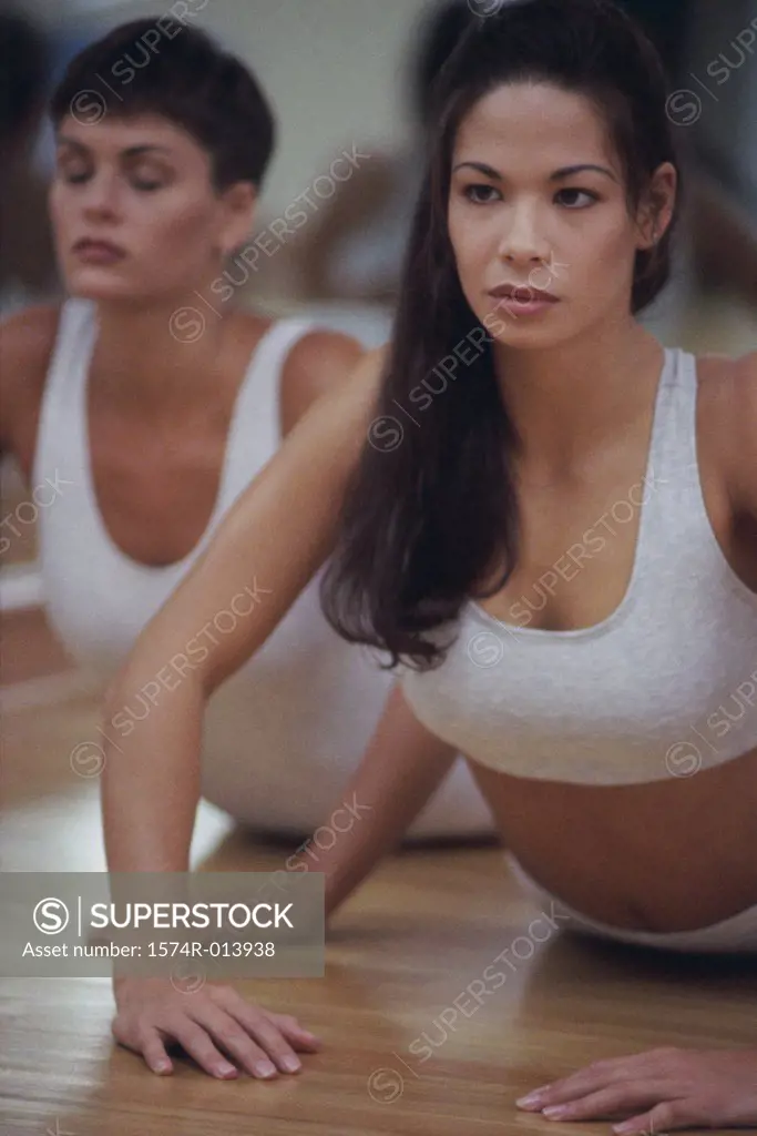 Two young women exercising