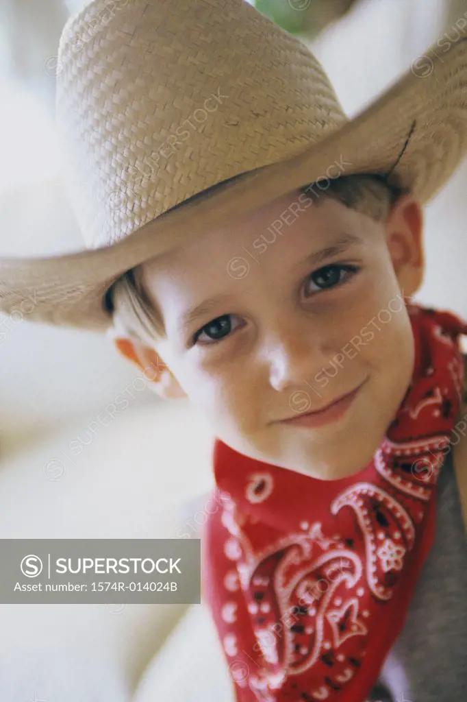 Portrait of a boy wearing a cowboy hat