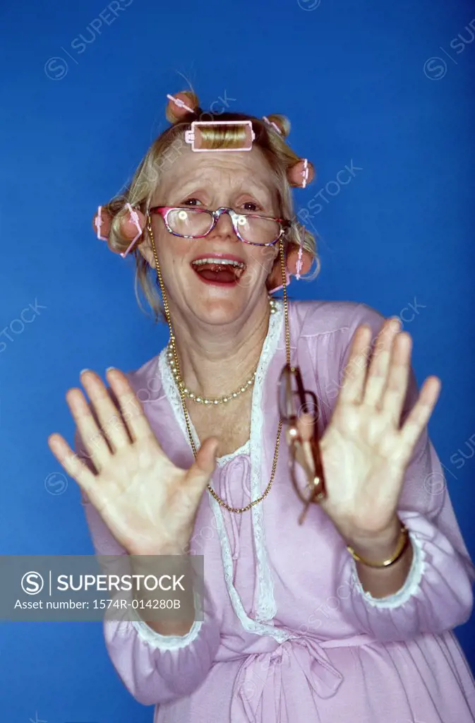 Portrait of a senior woman making a stop gesture