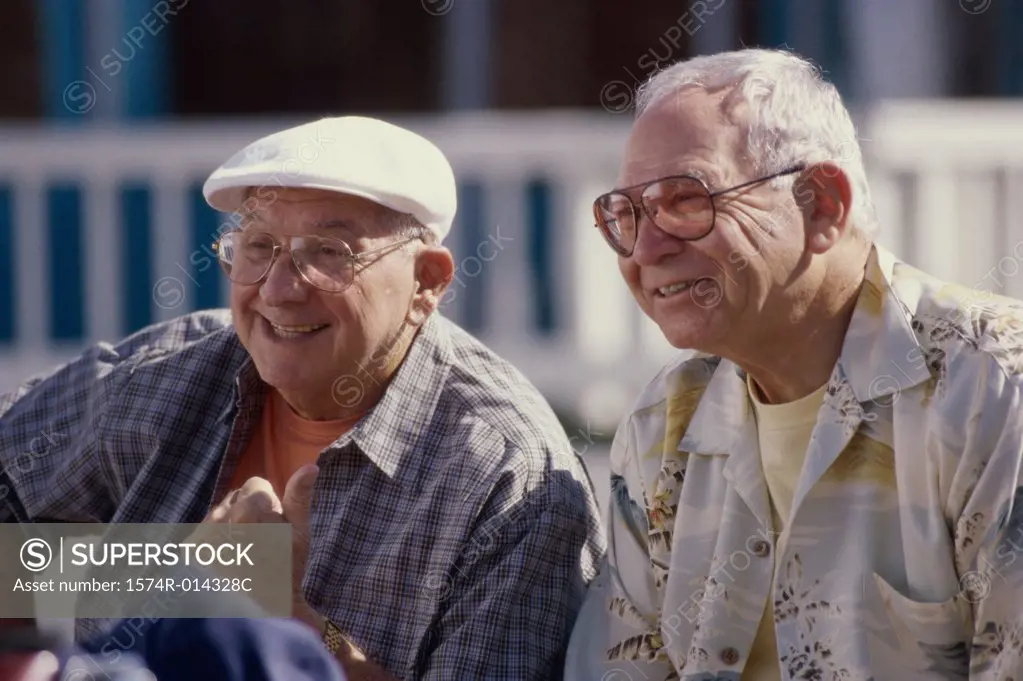 Two senior men smiling