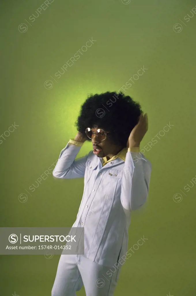 Young man with his hand in his hair