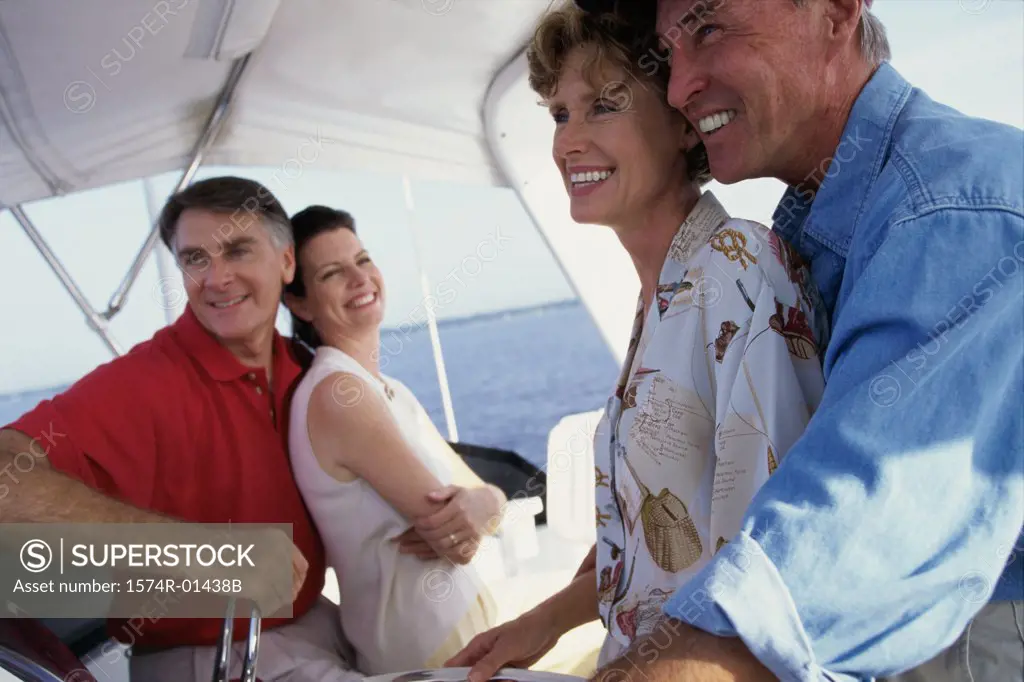 Two couples on a boat