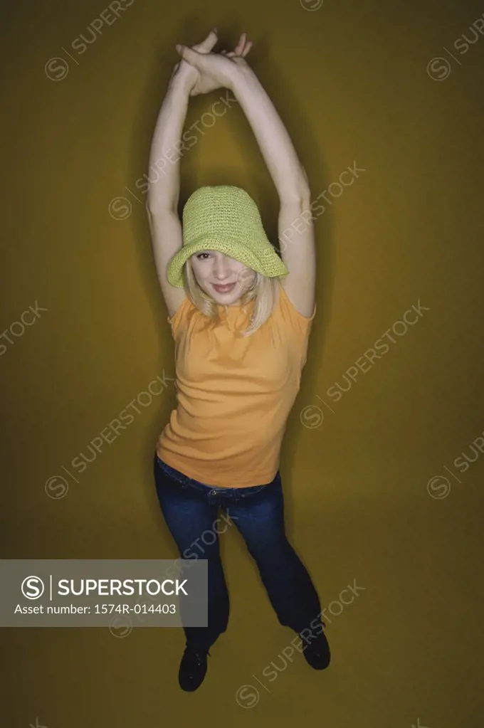 Portrait of a teenage girl stretching her arms