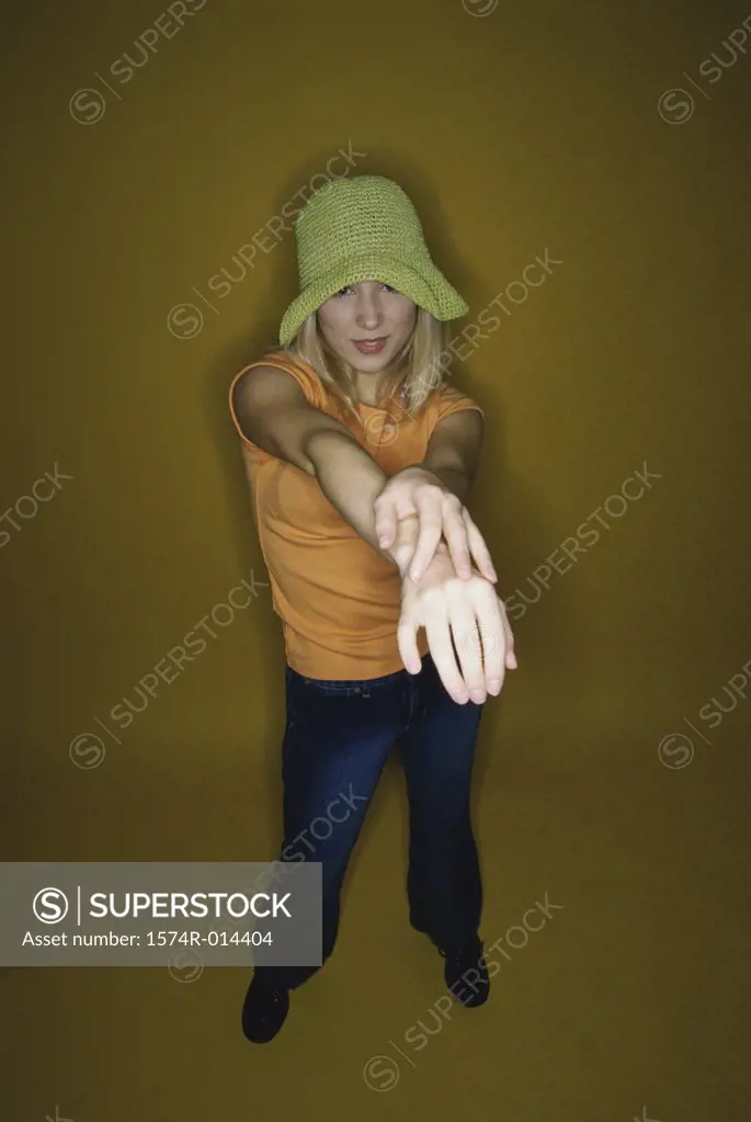 Portrait of a teenage girl stretching her arms