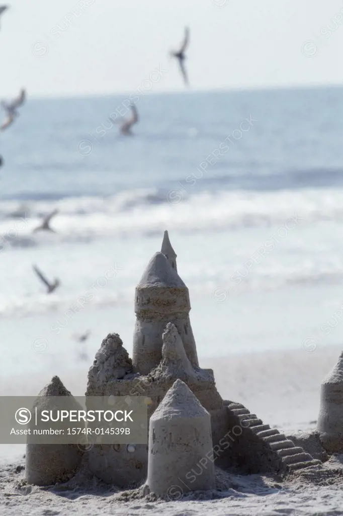 Close-up of a sand castle on the beach