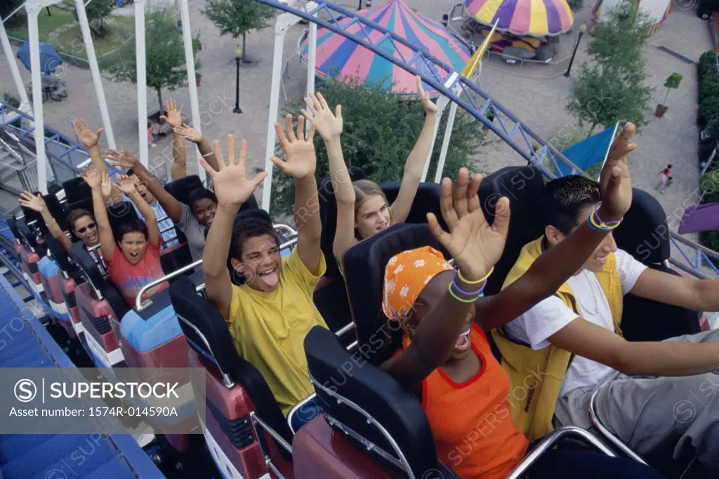 High angle view of a group of teenagers riding a rollercoaster
