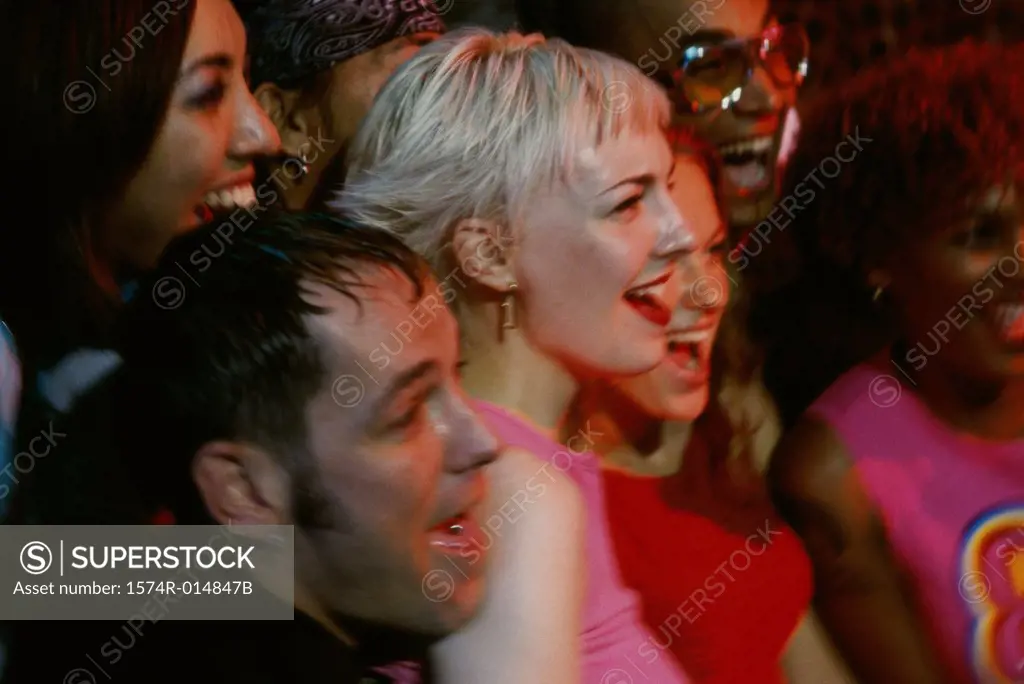 Close-up of a group of friends laughing together