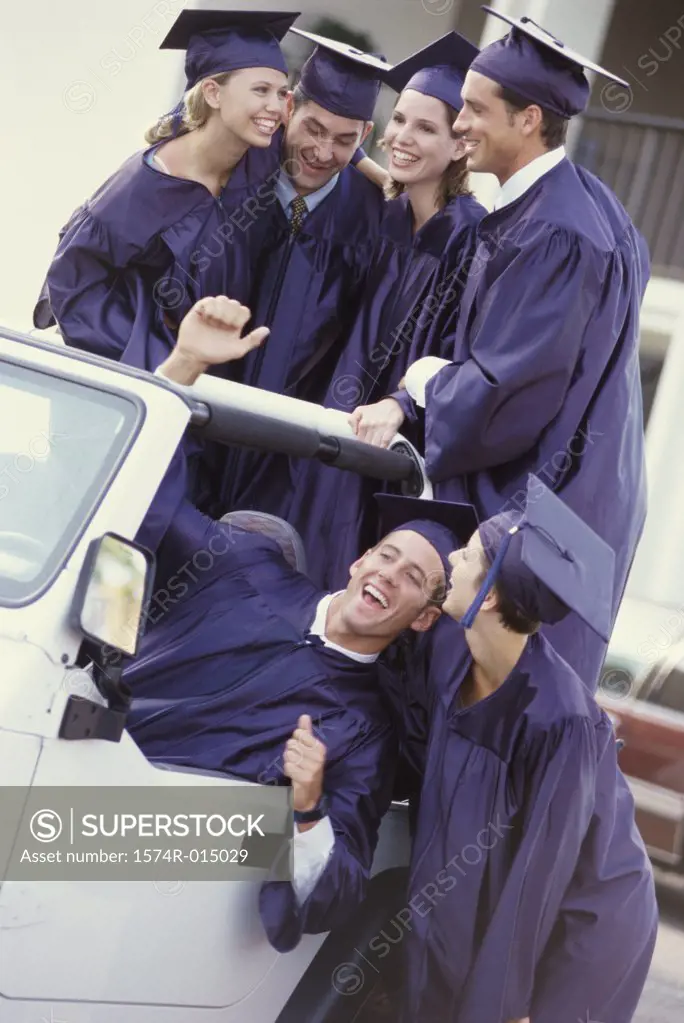 Group of college students celebrating their graduation
