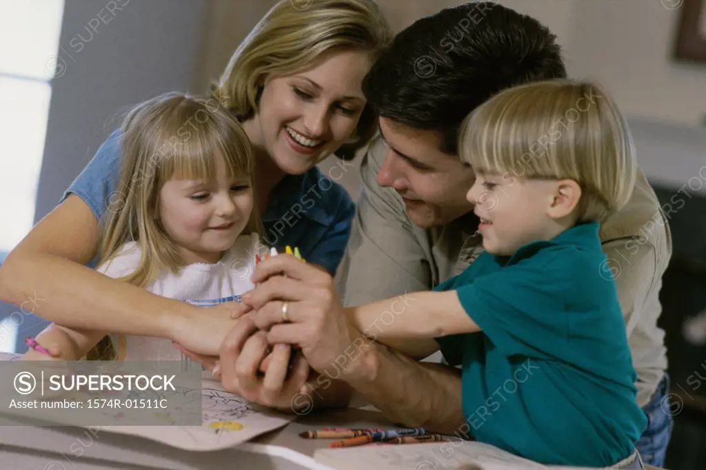 Parents and their children with coloring books