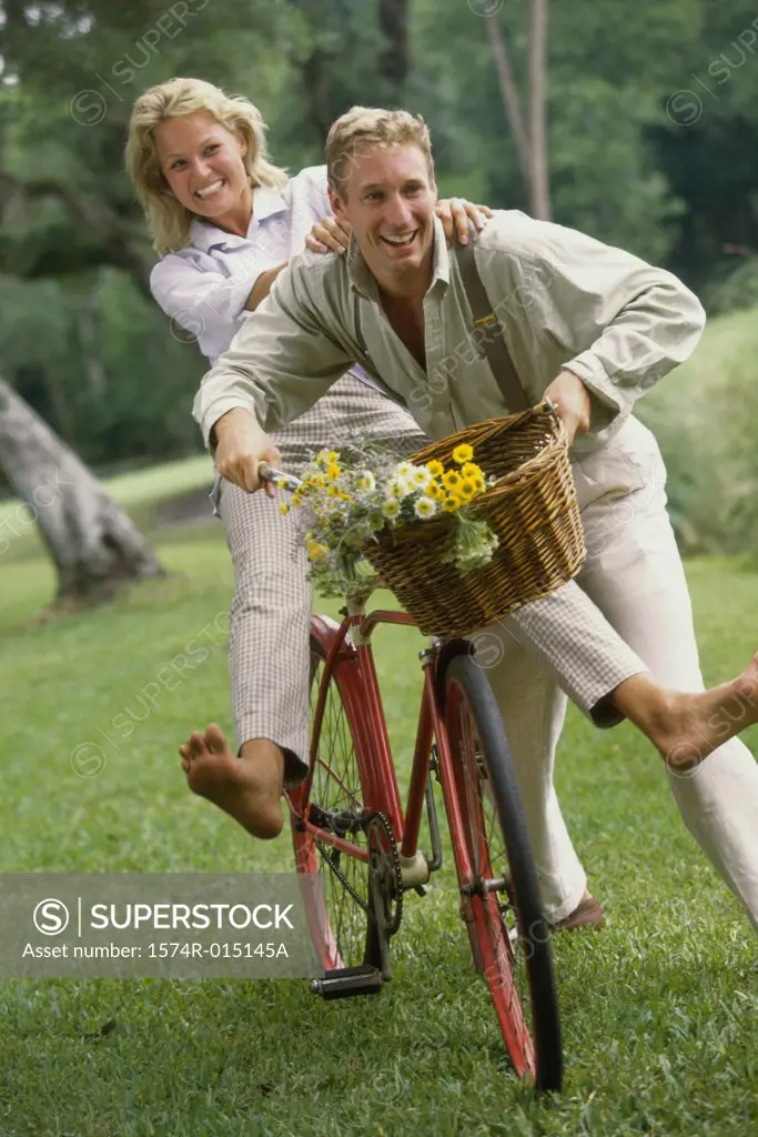 Young couple riding a bicycle