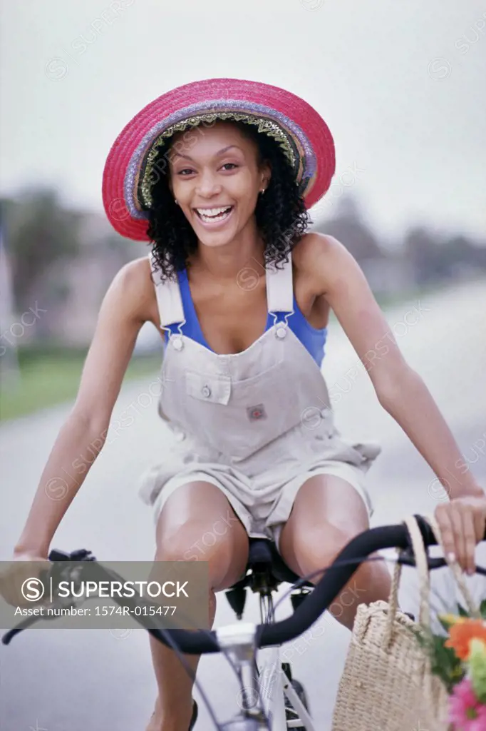 Portrait of a young woman cycling