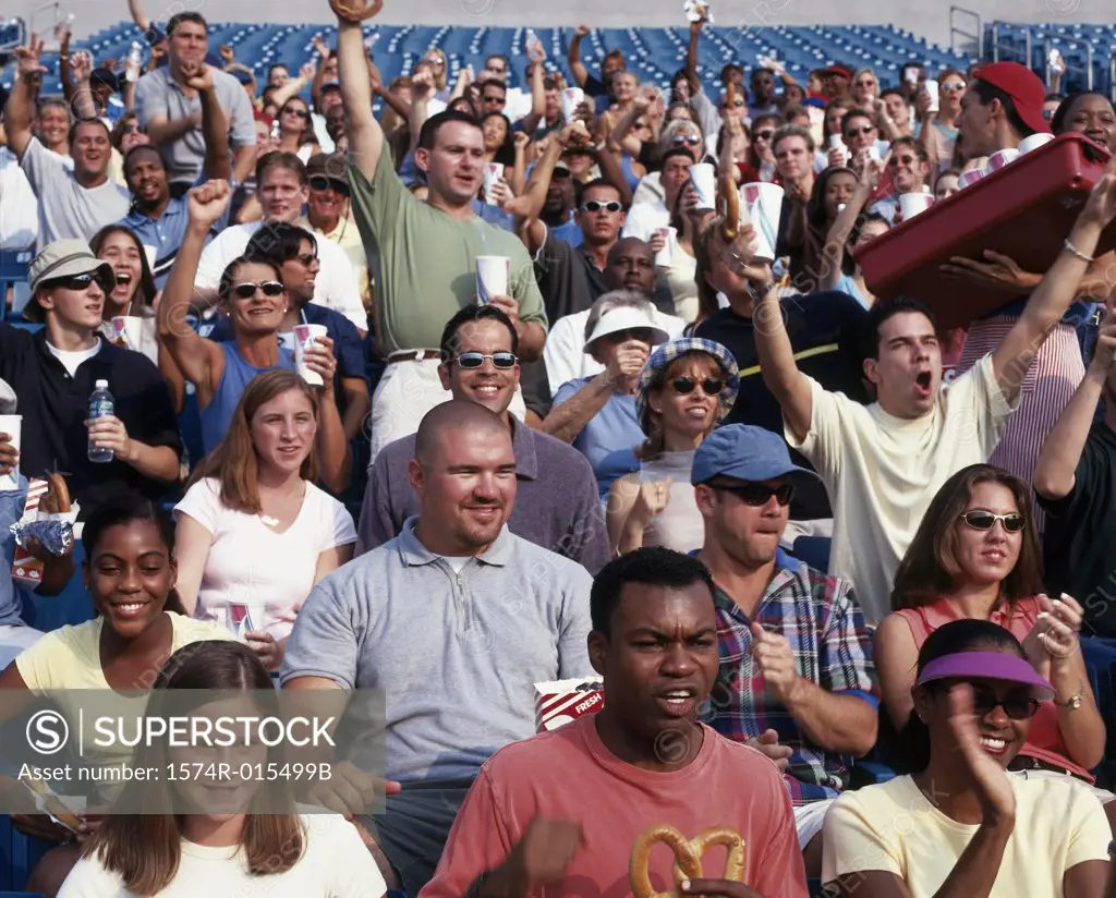 Group of spectators in a stadium cheering