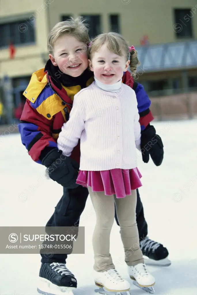 Portrait of two girls ice skating
