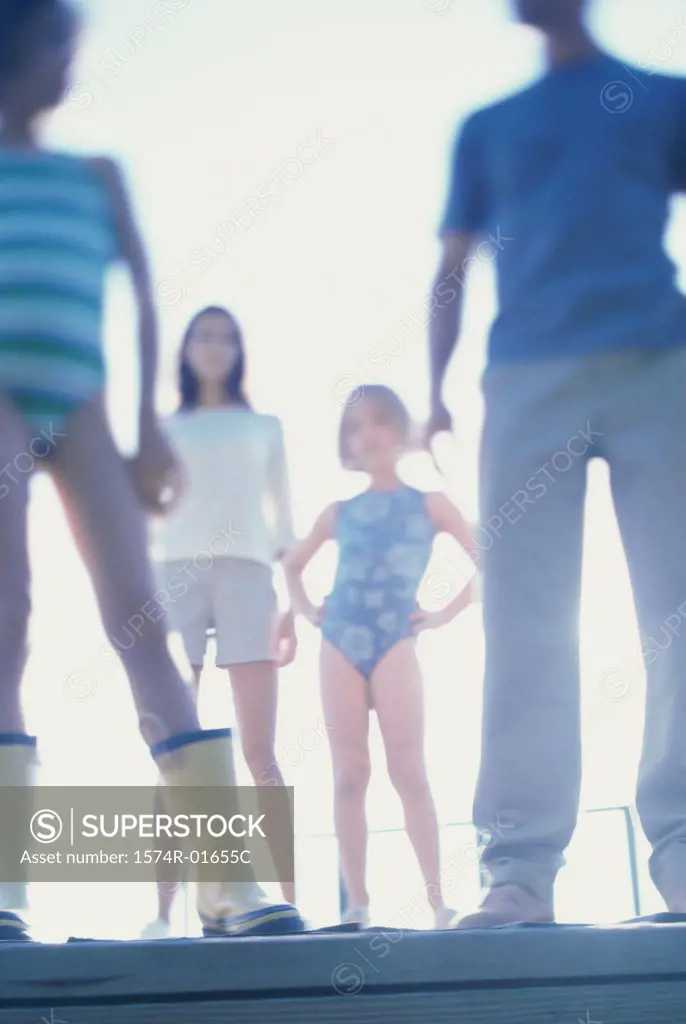 Low angle view of parents with their two daughters