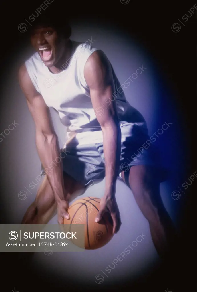 Basketball player holding a basketball