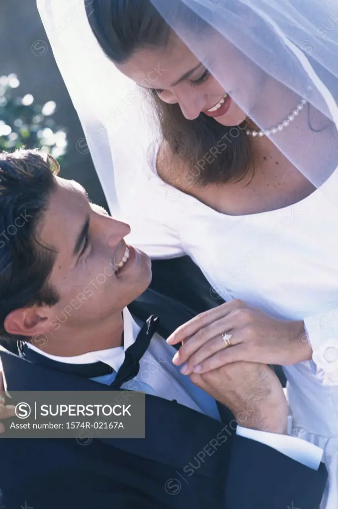 High angle view of a newlywed couple looking at each other