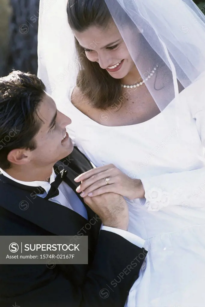 High angle view of a newlywed couple looking at each other