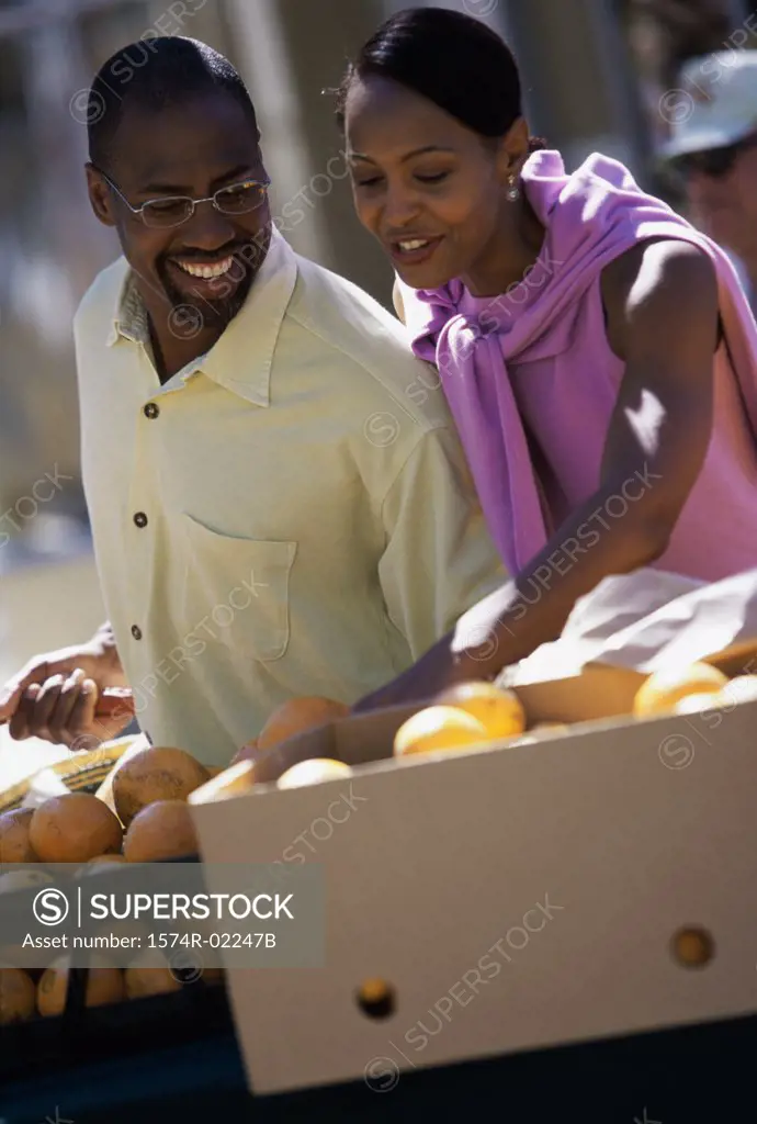 Young couple shopping in the market