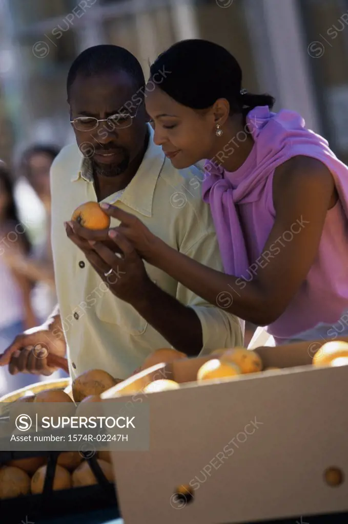 Young couple shopping in the market