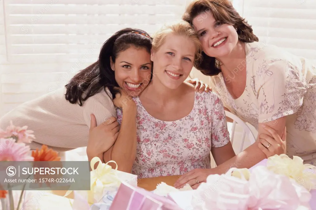 Portrait of three young women at a baby shower
