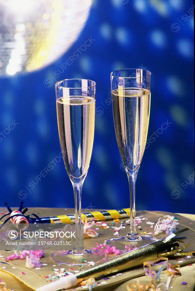 Close-up of two champagne flutes on a table