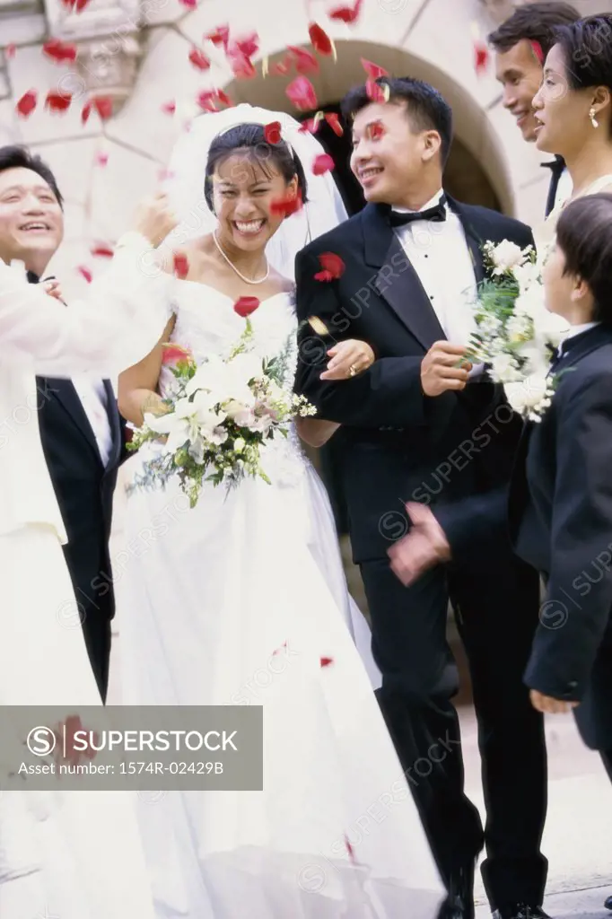 Flower petals thrown on a newlywed couple