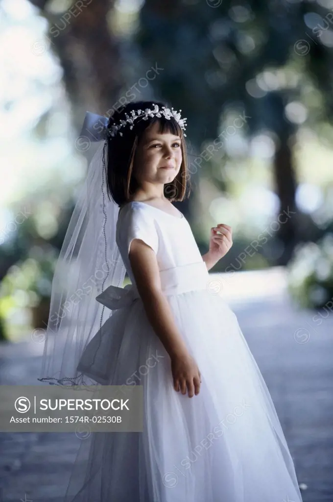 Side profile of a flower girl smiling