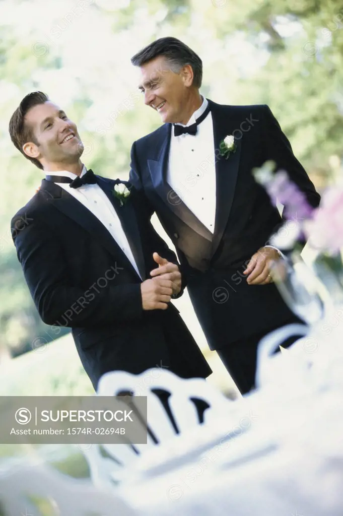 Newlywed young man with his father